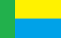 Flaga Postańskiej Autonomii, przedstawiająca: zielony- trawe, żółty - słońce a niebieski, wolność